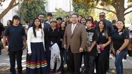 Group photo with Assemblymember Ramos and rally attendees